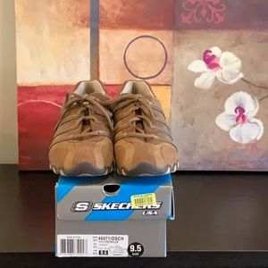 Skechers brown suede sneaker. Size 9 1/2. Extra set of laces included.